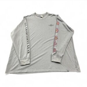 Nike ACG Baby Blue Long Sleeve Tee with Pink Floral Sleeve Accents
